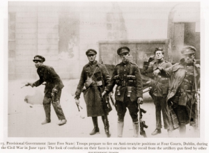 National Army troops just as the Four Courts in Dublin explodes. Note the Thompson submachine guns.