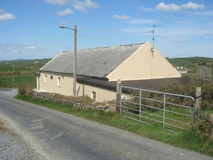 The former National School at Moy. The Moy Company of the IRA had a secret arms dump at the school. Private Chalmers is alleged to have been brought here before being executed and secretly buried in the area.