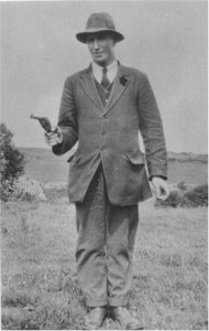 Commandant Séamus Hennessy, who presided over Private Chalmers execution and secret burial in June 1921, posing with Webley revolver during the Civil War.
