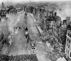 Crowds watch as the last anti-Treaty forces are cleared from O'Connell Street in July 1922.