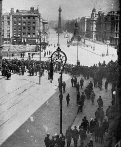 Dublin crowds watch the fighting on O'Connell Street in July 1922.