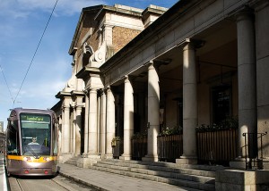 The new Luas light rail stops outside the 19th century train station on Harcout Street.