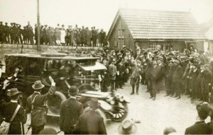 The Volunteers cheer as a car takes the newly imported rifles away from Howth pier.