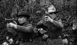 Two IRA Volunteers demonstrate the Thompson submachine gun, in Dublin 1921.