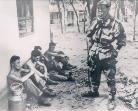 Irish prisoners being gaurded by Katangese mercenary forces after the battle of Jadotville.